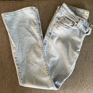 Levi’s superlow bootcut distressed jeans style 318